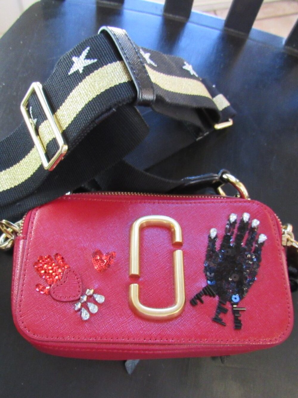THE MARC JACOBS Snapshot Hand to Heart Crossbody Camera Bag In Red